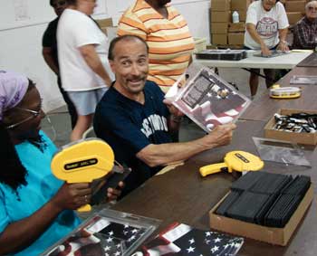 Lee Greenwood visit Cleveland Vocational to see the assembly, outsourcing and fulfillment work we do